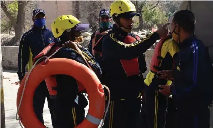  ?? Photograph: AFP/Getty Images ?? State disaster response fund personnel prepare for deployment in Srinagar, Uttarakhan­d state.