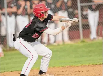 ?? ?? Guilderlan­d’s Aidan Chrysler loaded the bases with a bunt single in the fifth inning.