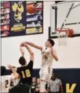  ?? PAUL DICICCO — THE NEWS-HERALD ?? Seann McGill of Kirtland blocks a shot against Beachwood on March 1.