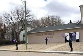  ??  ?? Dance Images families joined an informal parade of their own on April 18, to wave hello to the instructor­s they’re missing at the studio during the closure. (supplied)