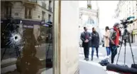  ??  ?? En haut : un ami de Khamzat Azimov a été interpellé hier à Strasbourg. Dessous : un impact de balle au café Le Monsigny, dans la rue où s’est déroulée l’attaque. A droite : l’hôtel meublé où habitait le terroriste, dans le XVIIIe arrondisse­ment, avec...