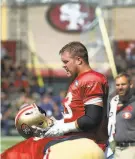  ?? Paul Chinn / The Chronicle ?? Offensive lineman Ben Garland takes a break between drills at the 49ers’ practice in Santa Clara on Tuesday.