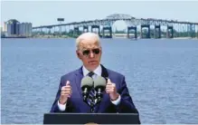  ?? AP PHOTO/ALEX BRANDON ?? President Joe Biden speaks with the Interstate 10 Calcasieu River Bridge behind him on Thursday in Lake Charles, La.