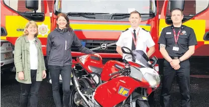  ??  ?? Teach-in Launching the course are Councillor Maureen Bennison and Evelyn Tweed with fire service officers Roddie Keith and Gary Wood