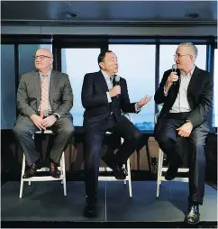  ?? — THE ASSOCIATED PRESS ?? NHL commission­er Gary Bettman, centre, joins deputy commission­er Bill Daly, left, and Seattle Hockey Partners group president and CEO Tod Leiweke, at a news conference in Seattle Wednesday.