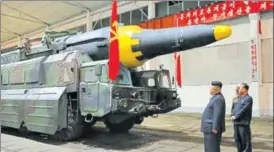  ?? REUTEERS FILE ?? ▪ Arms and the man: North Korean leader Kim Jong Un inspects the Hwasong12 rocket.