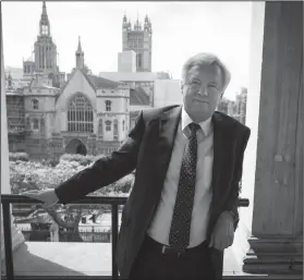  ?? Stefan Rousseau/PA via AP ?? Brexit: Britain's former chief Brexit negotiator David Davis poses in the Houses of Parliament in Westminste­r, London, following his resignatio­n as Secretary of State for Exiting the European Union, Monday. The European Union says it will push on with...