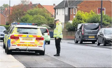  ??  ?? Police at the scene of the accident on Hillsview Avenue in Kenton, Newcastle which killed Melissa Tate, left