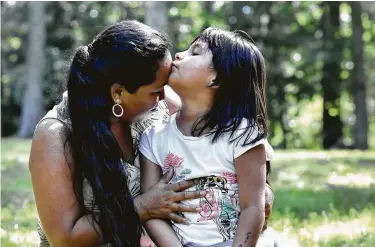  ?? Josh Reynolds / Washington Post ?? Sandy Gonzalez, 8, and her mother, Angelica Gonzalez-Garcia, are now staying at a home near Boston. Mother and daughter were reunited July 5 after being separated at the border and detained by ICE.
