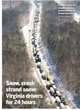  ?? STEVE HELBER/AP ?? Cars and trucks are stranded Tuesday on Interstate 95 in Carmel Church, Va.