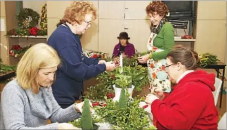  ?? SUBMITTED PHOTO ?? Master Gardeners Nancy Pasquier, Linda Barry, Gerri Eunson, Julia King, and Diana Breen prepare items for the Dec. 9 Greens & Gifts sale.