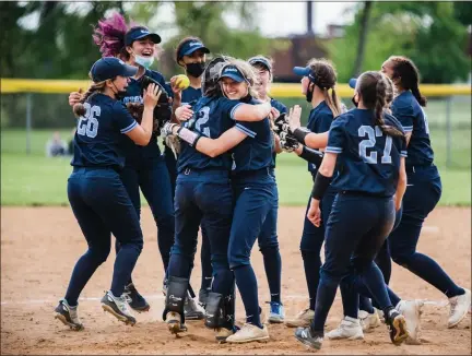  ?? MEDIANEWS GROUP PHOTO ?? The North Penn Knights celebrate around pitcher Mady Volpe (3) earlier this season.