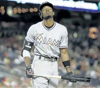  ?? ALEX BRANDON /ASSOCIATED PRESS ?? Miami Marlins’ Dee Gordon, the reigning NL batting champion, says he unknowingl­y took the performanc­e-enhancing drug that led to his 80-game suspension. The startling announceme­nt of the suspension by Major League Baseball came shortly after the...