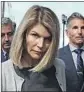  ?? Boston Globe ?? LORI LOUGHLIN and her husband, J. Mossimo Giannulli, right.