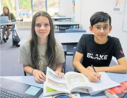  ?? Photo / Peter de Graaf ?? Springbank School pupils Evie Trotter, 13, and Ronan Leung, 12, say their futures depend on action taken now to combat climate change.