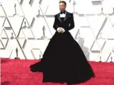  ?? RICHARD SHOTWELL/INVISION/AP ?? Billy Porter arrives at the Oscars in his Christian Siriano tuxedo gown.