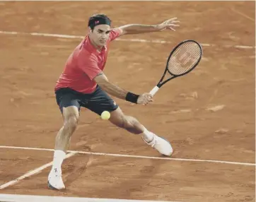  ??  ?? 0 Roger Federer plays a backhand during his match against Dominik Koepfer of Germany