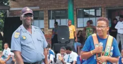  ?? ?? Richards Bay SAPS members Warrant Officer Jeoffrey Mkhize and Captain Michelle Michael at a crime prevention awareness campaign at Aquadene Secondary School last year. The local police station will roll out their safety and awareness programmes at pre-schools, primary and high schools to continue with their crime fighting efforts