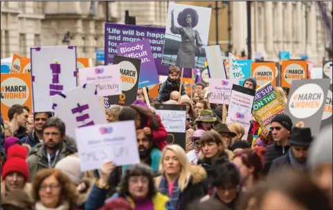  ??  ?? THOUSANDS joined the March4Wome­n in Westminste­r yesterday, to mark the centenary of votes for women being granted