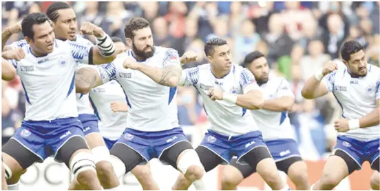  ?? Samoa perform their war dance. ??