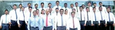  ??  ?? PLC Senior Management with staff of Ratnapura branch