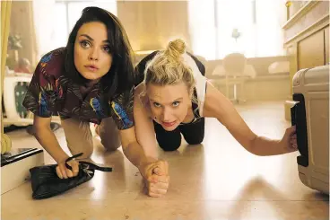  ??  ?? Mila Kunis, left, and Kate McKinnon embark on an involuntar­y European adventure.