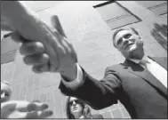  ?? AP/JAE C. HONG ?? President Barack Obama (left photo), with New York Gov. Andrew Cuomo (center) tours the College of Nanoscale Science and Engineerin­g in Albany on Tuesday. At right, Mitt Romney makes a stop in Lansing, Mich.