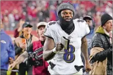  ?? GODOFREDO A. VÁSQUEZ/AP PHOTO ?? Baltimore Ravens quarterbac­k Lamar Jackson (8) smiles as he runs off the field after the Ravens defeated the San Francisco 49ers in Monday night’s game in Santa Clara, Calif.
