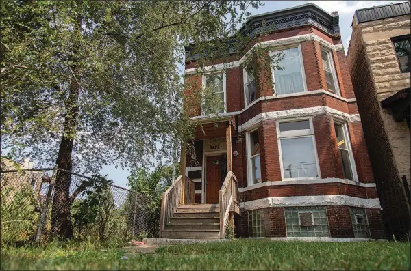  ?? (File Photo/AP/Chicago Sun-Times/Anthony Vazquez) ?? The former home of Emmett and Mamie Till at 6427 S. St. Lawrence Ave. is pictured Aug. 26, 2020, in the West Woodlawn neighborho­od of Chicago. The home is one of more than two dozen historical­ly significan­t sites that will share $3 million in grant money from a preservati­on organizati­on.