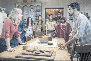  ?? BERTRAND CALMEAU — CBS VIA AP ?? Rose McIver, foreground left, and Utkarsh Ambudkar in a scene from the comedy series “Ghosts.”