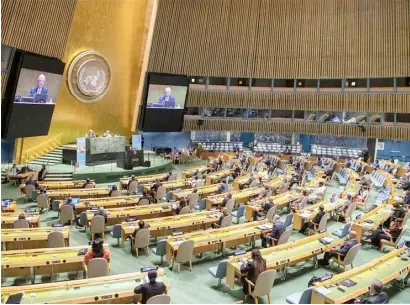  ??  ?? VOLKAN Bozkir (rear left), president of the 75th session of the United Nations General Assembly, addresses a high-level meeting to commemorat­e the 75th anniversar­y of the UN at its headquarte­rs in New York.