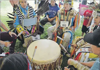  ?? CHRIS SHANNON/CAPE BRETON POST ?? The East Boyz of Eskasoni competed in the drumming competitio­n at the Eskasoni powwow on Saturday, along with three other drumming groups.