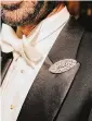  ?? ?? Fady Armanious wears a stunning brooch.