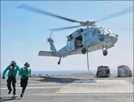  ?? AFP ?? An MH-60S Sea Hawk helicopter takes off from the American aircraft carrier USS Abraham Lincoln.