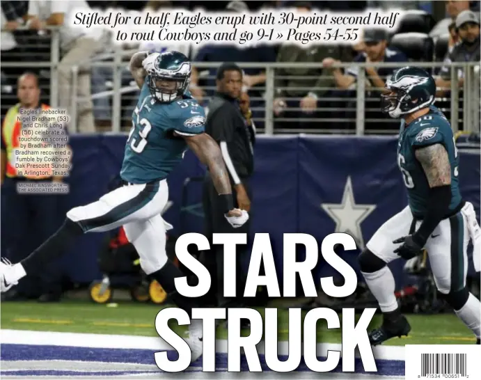  ?? MICHAEL AINSWORTH — THE ASSOCIATED PRESS ?? Eagles linebacker Nigel Bradham (53) and Chris Long (56) celebrate a touchdown scored by Bradham after Bradham recovered a fumble by Cowboys’ Dak Prescott Sunday in Arlington, Texas.