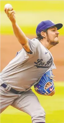  ?? DALE ZANINE/USA TODAY SPORTS ?? Los Angeles Dodgers starting pitcher Trevor Bauer is on paid administra­tive leave from MLB.