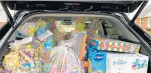  ?? CANCER CHRISTMAS WITHOUT ?? An SUV is packed for donation drop-offs March 20 led by Orland Park’s Maria Stefanos and Oak Lawn’s Christmas Without Cancer.