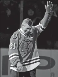  ?? BRIAN KERSEY/AP PHOTO,FILE ?? In this March 7, 2008, file photo, Chicago Blackhawks great Stan Mikita waves to fans as he is introduced before an NHL hockey game against the San Jose Sharks in Chicago. Mikita, who played for the Blackhawks for 22 seasons, becoming one of the franchise’s most revered figures, has died, the Blackhawks announced Tuesday. He was 78.