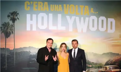  ?? Photograph: Marco Ravagli/Barcroft Media ?? Quentin Tarantino (left) with Margot Robbie and Leonardo Di Caprio before the Italian premiere of Tarantino’s latest movie Once Upon a Time … In Hollywood.