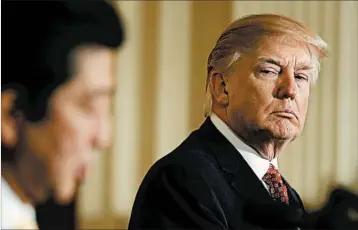  ?? CAROLYN KASTER/AP ?? President Donald Trump reassured Japanese Prime Minister Shinzo Abe on Friday that the U.S. would defend its close ally.