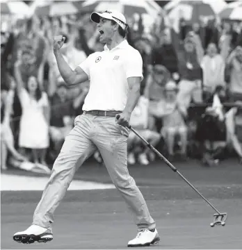 ?? AP Photo ?? IN THIS April 14, 2013, file photo, Adam Scott of Australia celebrates after a birdie putt on the 18th green during the fourth round of the Masters golf tournament in Augusta, Ga. Scott, whose world ranking has slid to No. 31, Wednesday, Nov. 29, 2017,...