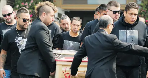  ?? ARLEN REDEKOP/PNG ?? Mourners at the funeral on Monday for Willis Hunt, who was killed during a road rage incident.