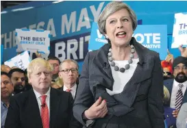  ??  ?? Prime Minister Theresa May speaks at a rally in Slough, England, as campaignin­g concluded ahead of today’s U.K. general election.