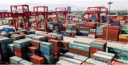  ??  ?? BELOW Owned by Shanghai Internatio­nal Port, Jiujiang Dock is part of the logistic network along the Yangtze River that forms part of China’s Maritime Silk Road initiative