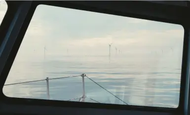  ?? FRANCESCA JONES/THE NEW YORK TIMES ?? A wind farm near Wick, Scotland. Energy workers in Britain are moving toward clean-energy jobs.