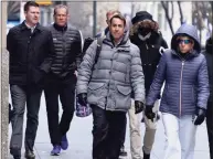  ?? Craig Ruttle / Associated Press ?? Major League Baseball deputy commission­er Dan Halem, center, arrives for a meeting in New York on Monday.