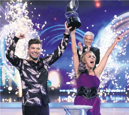  ??  ?? Triumphant: Sonny Jay and Angela Egan celebrate winning Dancing on Ice