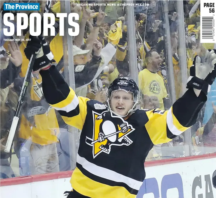  ?? — GETTY IMAGES ?? Jake Guentzel of the Pittsburgh Penguins celebrates after scoring to snap a 3-3 tie with 3:17 left in Monday’s Stanley Cup final opening game. The Pens won 5-3.