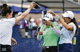  ?? AP ?? Minjee Lee, of Australia, celebrates a win after the final round of the U.S. Women’s Open at the Pine Needles Lodge & Golf Club in Southern Pines, N.C., on Sunday.