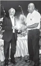  ??  ?? Ceyline Group Executive Chairman and CINEC Campus President Captain Ajith Peiris presents special awards to industry personnel